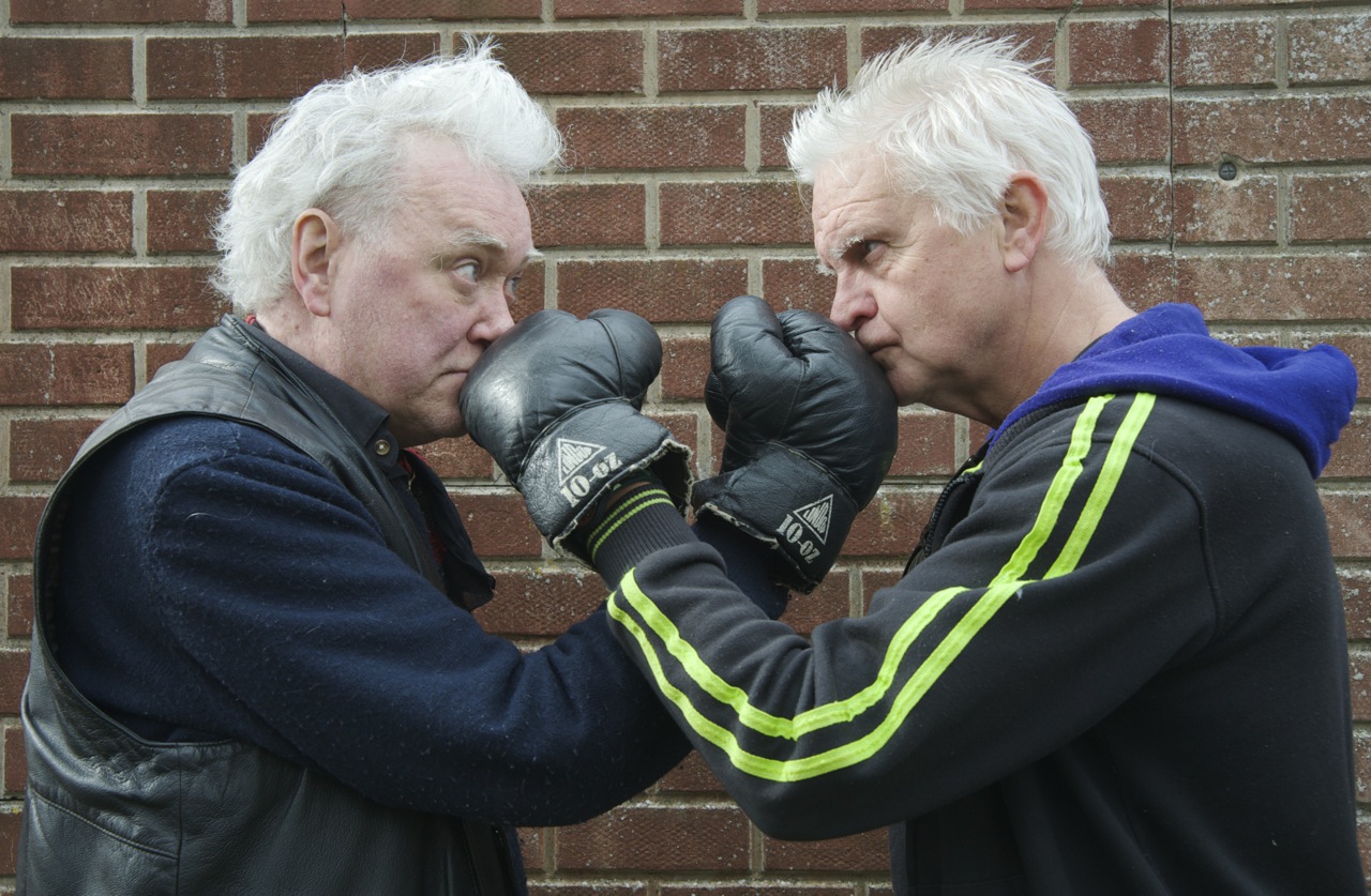 Billy Jenkins and Tony Messenger square up in the boxing ring. Photographed by Beowulf Mayfield