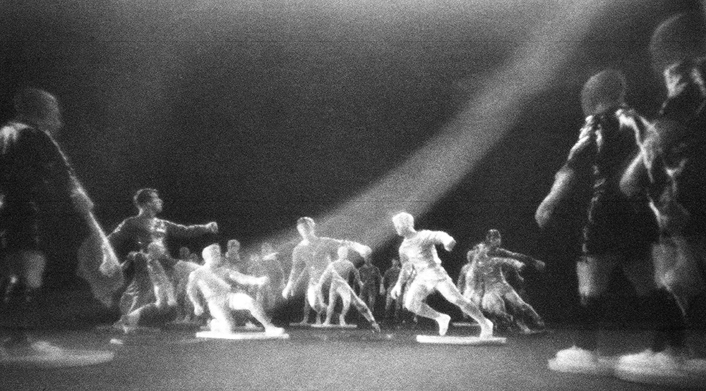 Pinhole image of toy footballers taken by Beowulf Mayfield