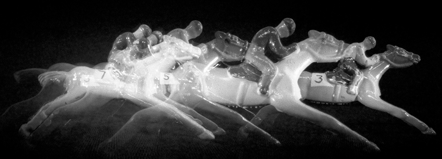 Vintage toy racehorses photographed with a pinhole camera