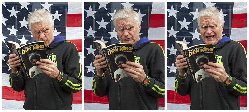 Tony Messenger reading about Don King. Photography by Beowulf Mayfield