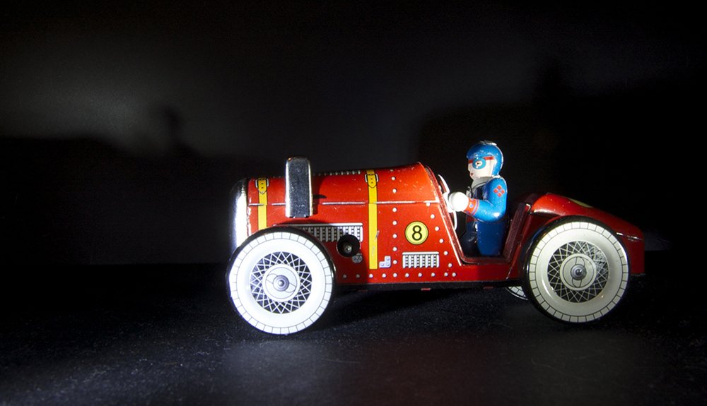 Static shot of toy red racing car